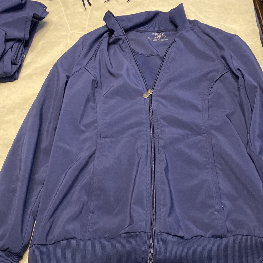 Cherokee Infinity Scrub set. Shirt, 2 pants, jacket, top. Sz small one med pant